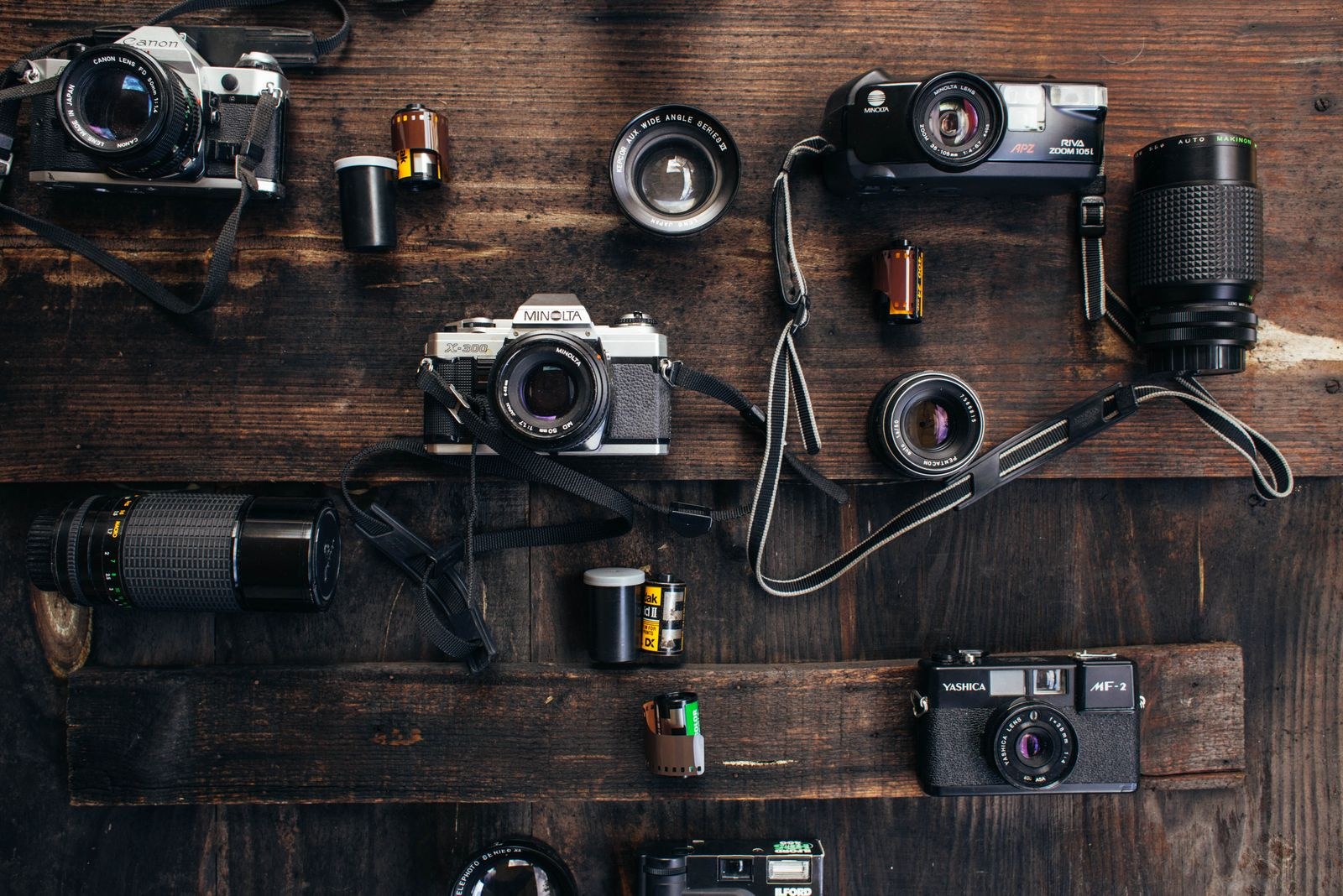 Camera and editing gear laid out flat